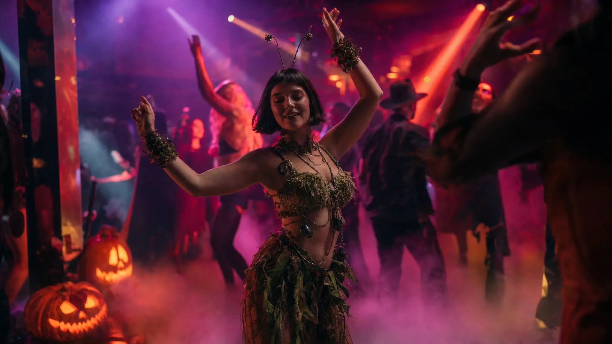 Adult in an original Halloween costume dancing in a neon club with glowing pumpkins